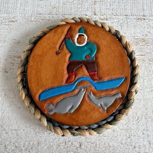 Vintage Embossed Leather Coaster with Inuit Seal Hunter on Corn Husk Trivet